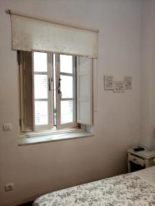 Posteľ alebo postele v izbe v ubytovaní Un Patio al Sur