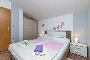 Posteľ alebo postele v izbe v ubytovaní Apartment Teri