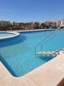 Bazén v ubytování Sunlight Apartment - Molino Blanco - La Zenia nebo v jeho okolí