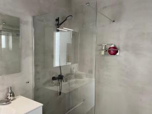 A bathroom at Luxury studio, sea view, pool