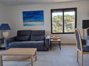 Posezení v ubytování Superbe appartement T3 face mer baie Ajaccio