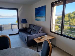 Posezení v ubytování Superbe appartement T3 face mer baie Ajaccio