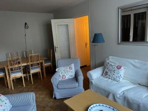 Coin salon dans l'établissement Superbe appartement à Bourg d'Oisans avec terrasse Sud