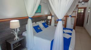 Cama ou camas em um quarto em Hotel Solar do Imperador
