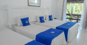 Cama ou camas em um quarto em Hotel Solar do Imperador