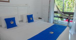 Cama ou camas em um quarto em Hotel Solar do Imperador