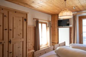 Postel nebo postele na pokoji v ubytování Alpina Hotel-Apartments