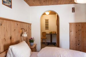 Postel nebo postele na pokoji v ubytování Alpina Hotel-Apartments
