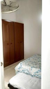 En eller flere senge i et værelse på Apartamento amoblado en La Tebaida, Quindio