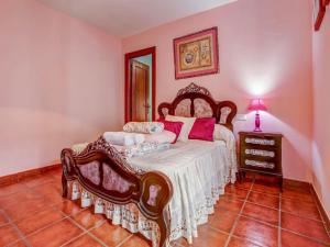 Posteľ alebo postele v izbe v ubytovaní Belvilla by OYO Cortijo Rural Puerto Nuevo