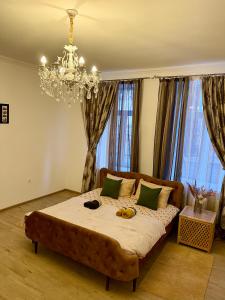 Ένα ή περισσότερα κρεβάτια σε δωμάτιο στο В САМОМУ ЦЕНТРІ МІСТА, ЗДАЮТЬСЯ В ПОДОБОВУ ОРЕНДУ, АПАРТАМЕНТИ ZONEofCOMFORT