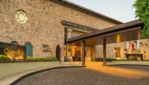 a store front of a brick building at Quinta Real Guadalajara in Guadalajara