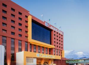 a building with a sign on the side of it at Camino Real Aeropuerto in Mexico City