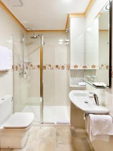 Koupelna v ubytování Hotel Rosa