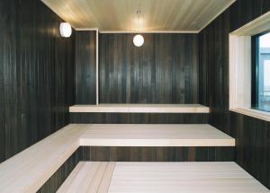 Dormy Inn PREMIUM Kushiro客房内的一张或多张床位