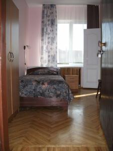 Postel nebo postele na pokoji v ubytování Daugavkrasti Hotel