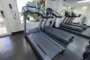 a row of treadmills in a gym at Best Western El Dorado Panama Hotel in Panama City