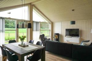 Khu vực ghế ngồi tại Ferienhaus Nordlys mit Sauna am Dümmer See, Dümmer