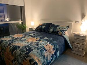 Voodi või voodid majutusasutuse Tantum Concon Apartment toas