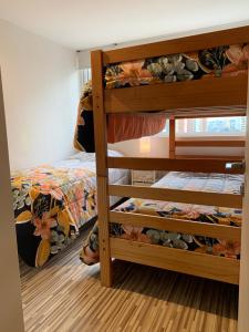 Voodi või voodid majutusasutuse Tantum Concon Apartment toas