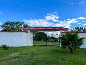 Zahrada ubytování Finca Turística Villa Natasha - Casa Campestre y Cabañas Villavicencio + 17 fotografií