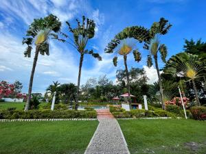 En hage utenfor Finca Turística Villa Natasha - Casa Campestre y Cabañas Villavicencio