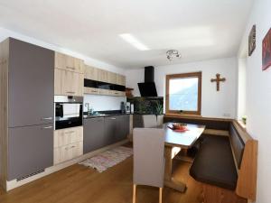 Kuchyň nebo kuchyňský kout v ubytování Apartment in Fügenberg near Spieljochbahn