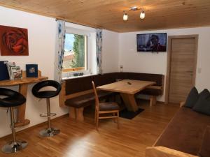A television and/or entertainment centre at Apartment in Bramberg am Wildkogel with balcony Még 29 kép