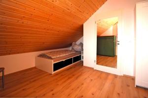Postel nebo postele na pokoji v ubytování Ferienhaus am Partwitzer See, Elsterheide