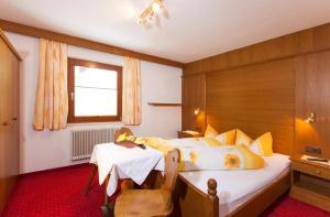 Łóżko lub łóżka w pokoju w obiekcie Appartement Jägerhof