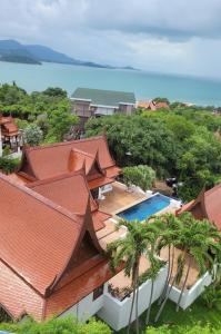 an aerial view of a house with a swimming pool at Oriental Thai Villa in Koh Samui 