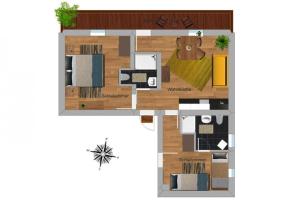 a floor plan of a small apartment with furniture at Apartment in Krimml with a balcony or terrace in Krimml