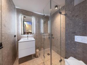Ένα μπάνιο στο Apartment in Bramberg with Mountain Views +24 φωτογραφίες