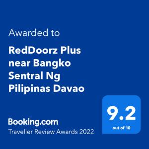 RedDoorz Plus near Bangko Sentral Ng Pilipinas Davao tesisinde sergilenen bir sertifika, ödül, işaret veya başka bir belge