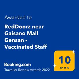 Ett certifikat, pris eller annat dokument som visas upp på RedDoorz near Gaisano Mall Gensan