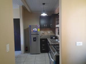 Kuchyň nebo kuchyňský kout v ubytování Tu casa Menus de Boquete te espera + 34 fotografií