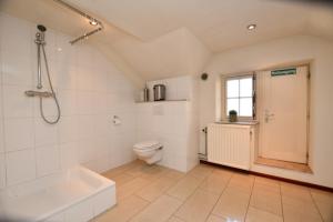 Koupelna v ubytování La Villa Spa, à 10 minutes à pied du centre ville + 8 fotografií