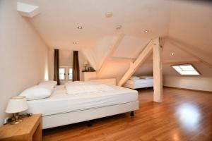 Postel nebo postele na pokoji v ubytování La Villa Spa, à 10 minutes à pied du centre ville