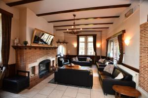 Posezení v ubytování La Villa Spa, à 10 minutes à pied du centre ville