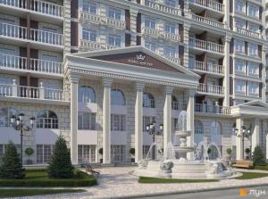 a large building with a fountain in front of it at Residential complex New England in Kyiv