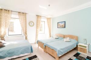 Posteľ alebo postele v izbe v ubytovaní Rooms Tezoro