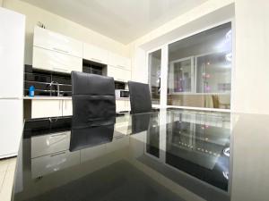 Kuchyňa alebo kuchynka v ubytovaní Most City Area De-Lux Apartment