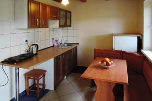 Dapur atau dapur kecil di Holiday House in Szczecin at the lake with parking space for 4 persons
