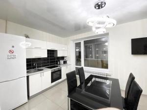 Kuchyňa alebo kuchynka v ubytovaní Most City Area De-Lux Apartment