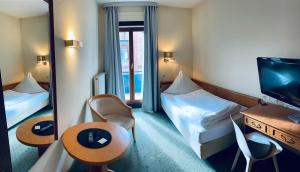 Postel nebo postele na pokoji v ubytování Meissmers Hotel + 37 fotografií
