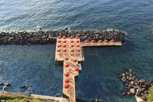 an aerial view of a wooden cross in the water at Grand Hotel Ambasciatori in Sorrento