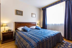 Posteľ alebo postele v izbe v ubytovaní Qubus Hotel Wrocław
