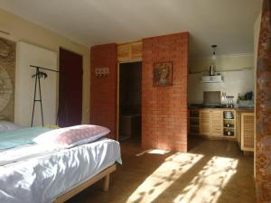 Ένα ή περισσότερα κρεβάτια σε δωμάτιο στο Minimax +17 φωτογραφίες