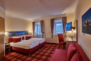 Postelja oz. postelje v sobi nastanitve Hotel Elbparadies