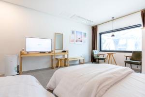 拉纳马度假屋客房内的一张或多张床位